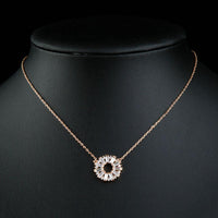 Close up detail of KHAISTA cubic zirconia chain necklace