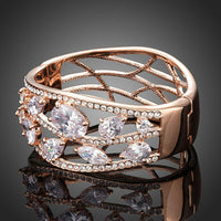 Close up detail of KHAISTA cubic zirconia cuff bangle