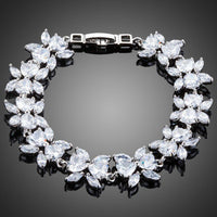 KHAISTA CZ flower garland bracelet on white background