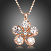 KHAISTA CZ flower pendant necklace on white background