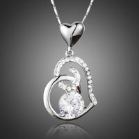 KHAISTA CZ heart pendant necklace on white background