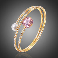 KHAISTA cubic zirconia pearl chain bracelet on white background