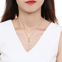 KHAISTA cubic zirconia pearl pendant necklace on white background