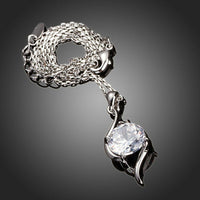 Close up detail of KHAISTA cubic zirconia pendant necklace