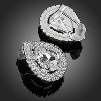 Side angle view of KHAISTA cubic zirconia stud earrings