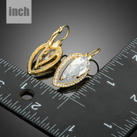 CZ water drop dangle earrings detail view by KHAISTA