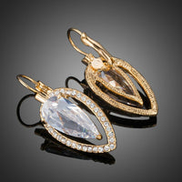 Close up of KHAISTA CZ water drop dangle earrings