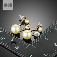 CZ pearl drop earrings detail view by KHAISTA
