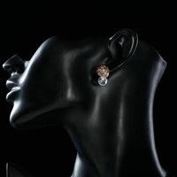 Side angle view of KHAISTA daily wear crystal stud earrings