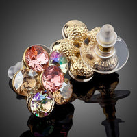Close up of KHAISTA daisy flower crystal stud earrings