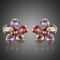 KHAISTA daisy flower crystal stud earrings on white background