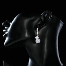 Load image into Gallery viewer, Dangling Cubic Zirconia Drop Earrings - KHAISTA Fashion Jewellery
