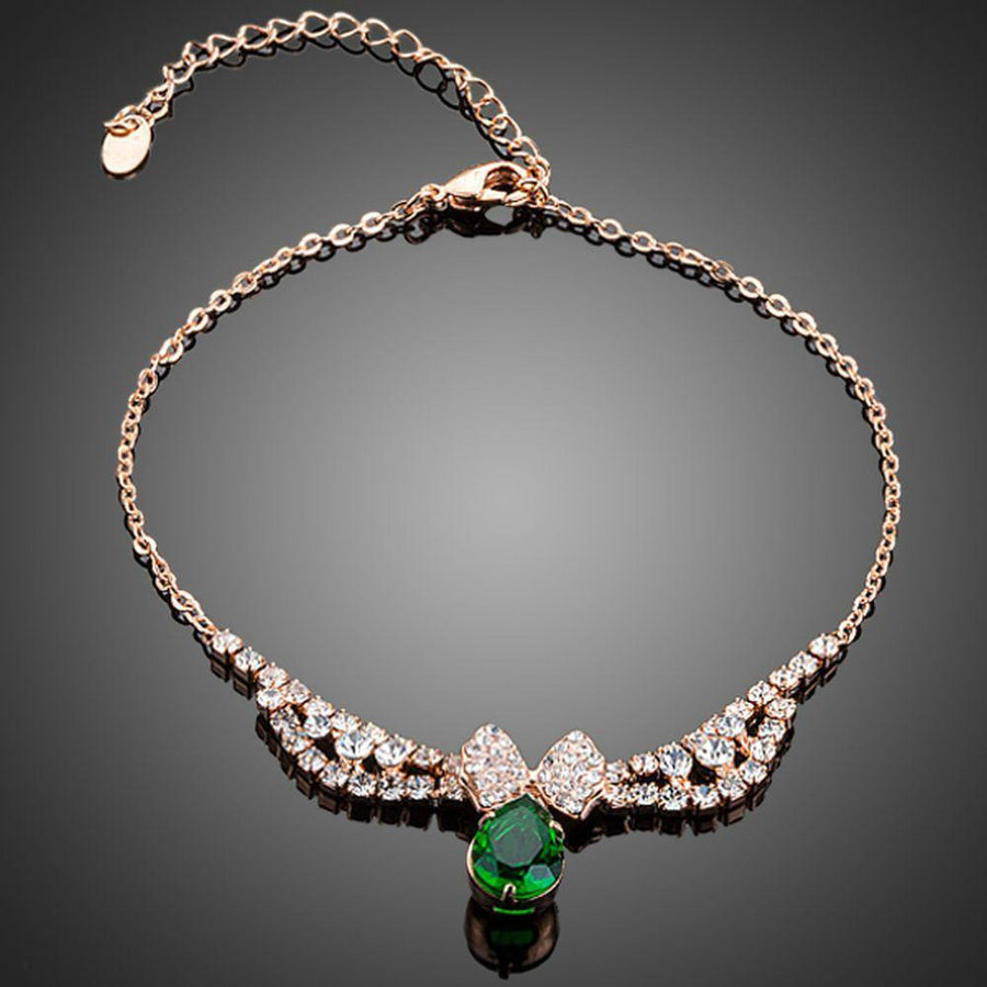 KHAISTA dark green CZ butterfly chain bracelet on white background