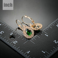 dark green CZ raindrop earrings detail view by KHAISTA