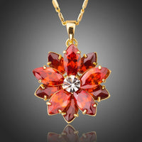 KHAISTA dark red flower CZ chain necklace on white background