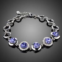 KHAISTA dark blue crystal chain bracelet on white background