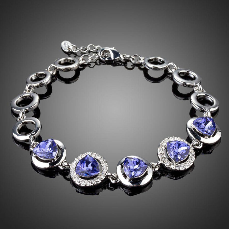 KHAISTA dark blue crystal chain bracelet on white background