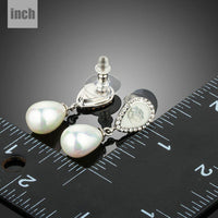 designer pearl drop earrings detail view by KHAISTA