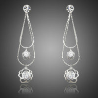 KHAISTA double flower crystal drop earrings on white background