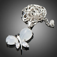 Close up detail of KHAISTA crystal dragonfly pendant necklace