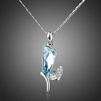 KHAISTA crystal dragonfly wings chain necklace on white background