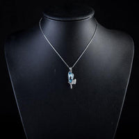 Close up detail of KHAISTA crystal dragonfly wings chain necklace
