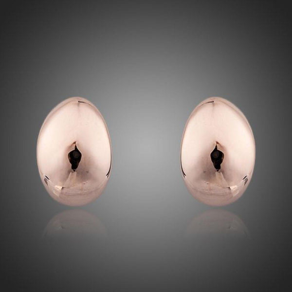 KHAISTA egg shape crystal stud earrings on white background