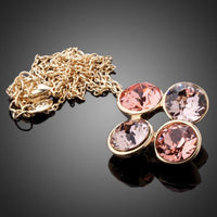 Side angle view of KHAISTA end to end crystal circles necklace