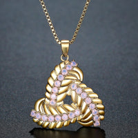 Close up detail of KHAISTA end to end crystal leaf necklace