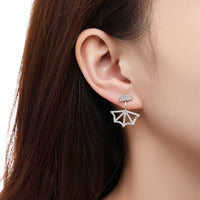 Side angle view of KHAISTA fan design crystal dangle earrings