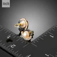pearl half ellipse rhinestone stud earrings detail view by KHAISTA