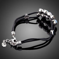 Close up detail of KHAISTA fashionable crystal strand bracelet