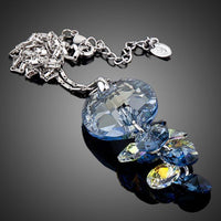 Close up detail of KHAISTA crystal fish design pendant necklace