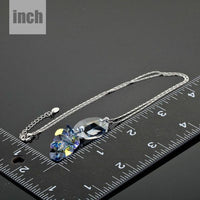 Pendant detail on KHAISTA crystal fish design pendant necklace