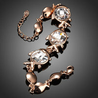 Close up detail of KHAISTA crystal fish bracelet