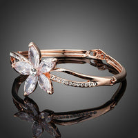 Close up detail of KHAISTA flower design CZ bangle