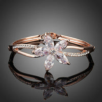 KHAISTA flower design CZ bangle on white background