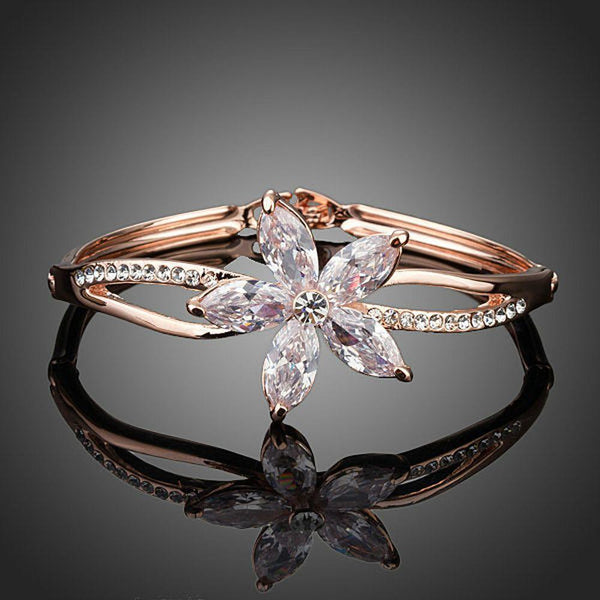 KHAISTA flower design CZ bangle on white background