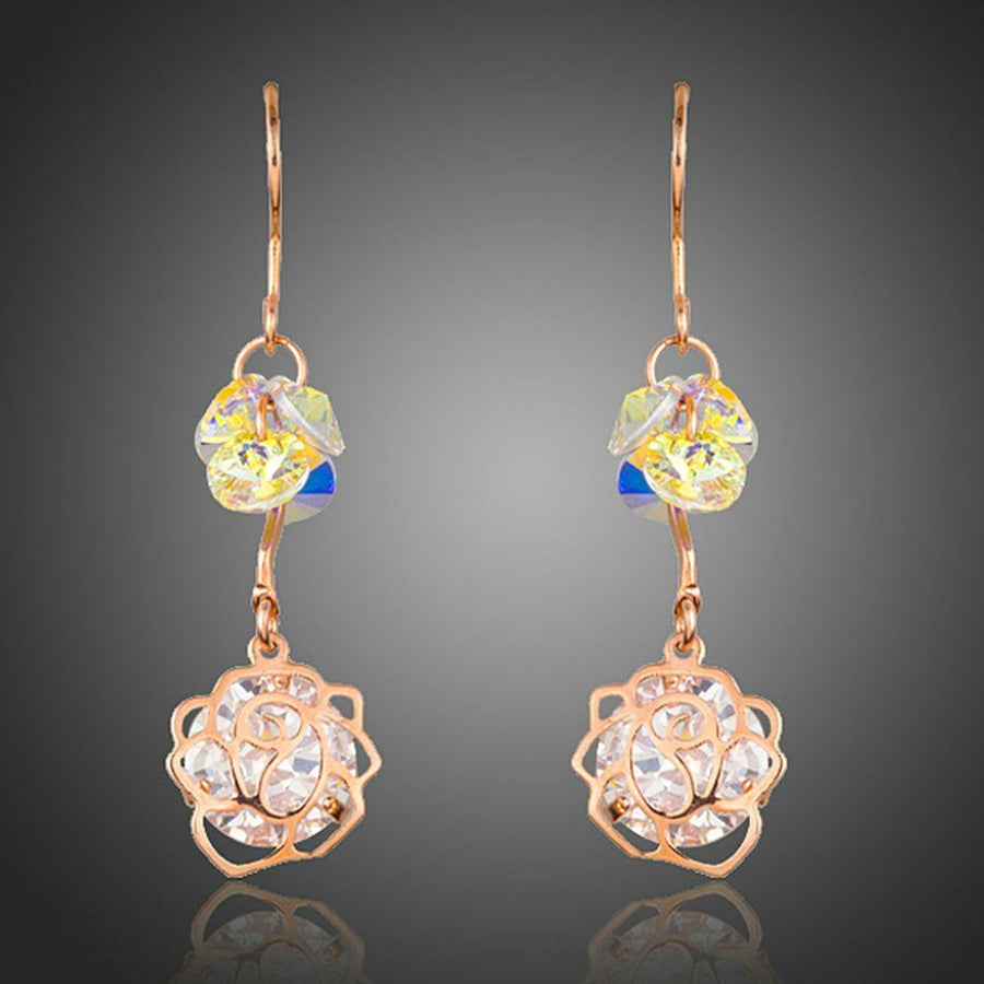 KHAISTA flower crystal drop hook earrings on white background