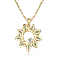 Side angle view of KHAISTA green CZ flower pendant necklace