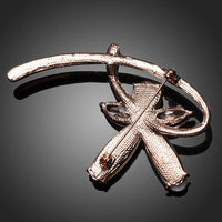 Close-up of crystals on Khaista plant shape brooch