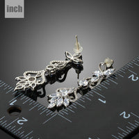 flower shape crystal drop earrings detail view by KHAISTA