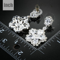 flower star CZ drop earrings detail view by KHAISTA