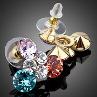 Side angle view of KHAISTA Stellux Austrian crystal flower stud earrings