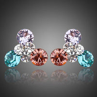 KHAISTA Stellux Austrian crystal flower stud earrings on white background