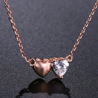 KHAISTA forever love double heart pendant necklace on white background