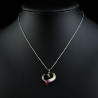 Close up detail of KHAISTA forever love crystal heart pendant necklace