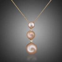 KHAISTA freshwater pearl pendant necklace on white background