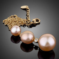 Close up detail of KHAISTA freshwater pearl pendant necklace