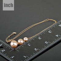 Pendant detail on KHAISTA freshwater pearl pendant necklace